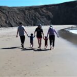 Family at Cooks Beach, photo by Tony Applegarth